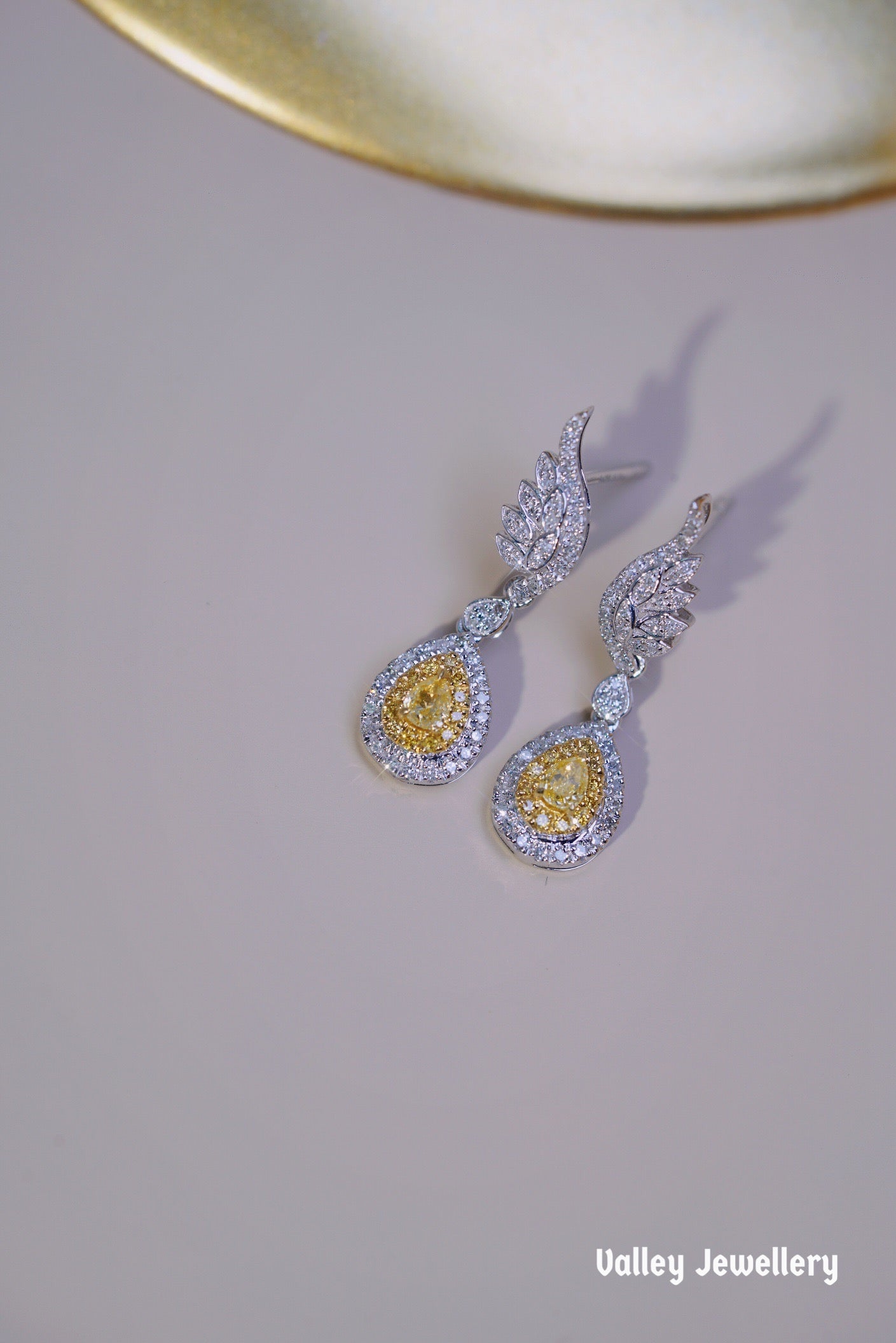 0.60ct 18K Yellow diamond earrings