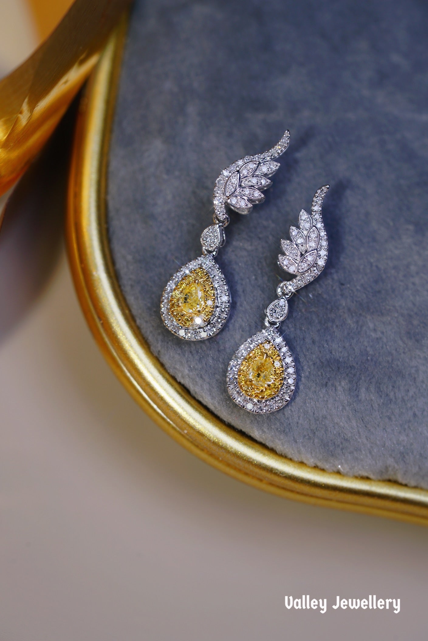 0.60ct 18K Yellow diamond earrings