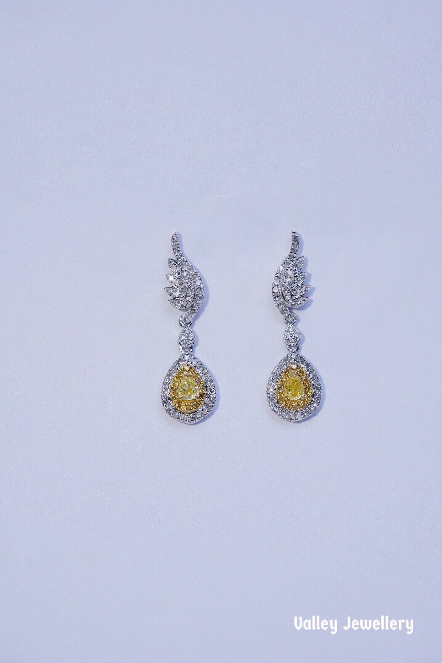 0.60ct 18K Yellow diamond earrings