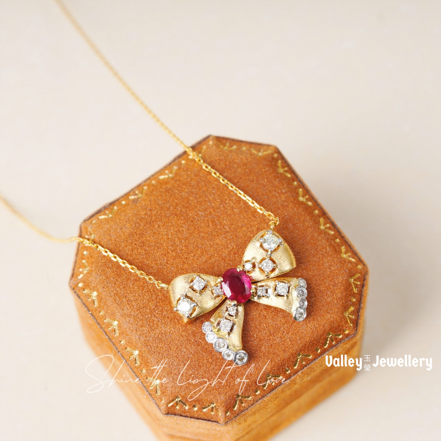 18K Yellow Gold Ruby Bowtie Pendant with Chain