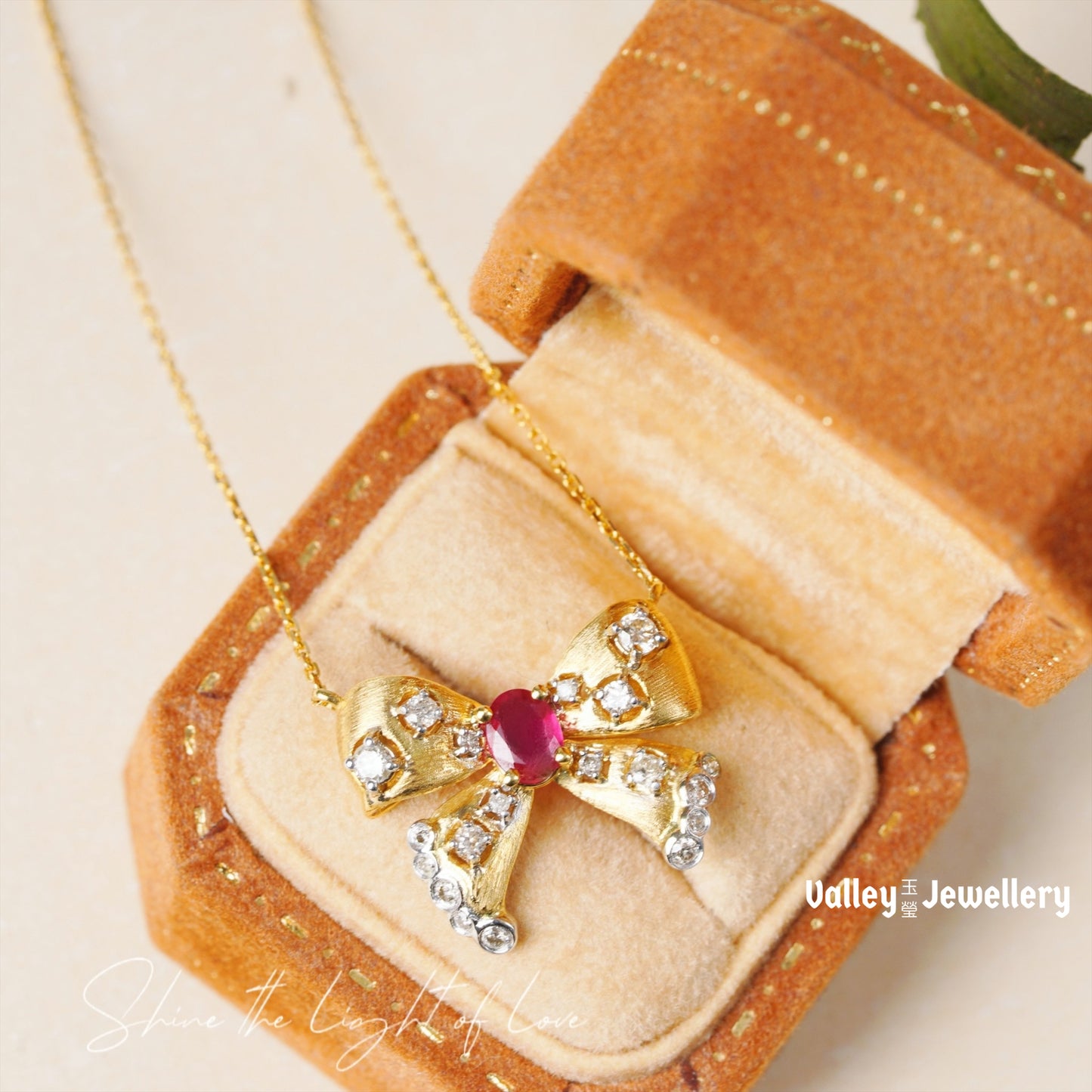 18K Yellow Gold Ruby Bowtie Pendant with Chain